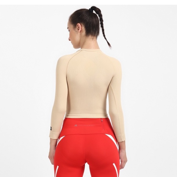 ADIDAS
Women Solid Round Neck Beige T-Shirt - Picture 2 of 9